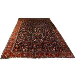 A Persian Heriz carpet