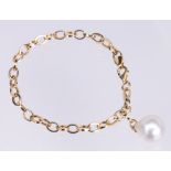 South Sea cultured pearl, 14k yellow gold bracelet