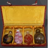 (lot of 4) Peking glass snuff bottles