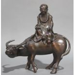 A Chinese Bronze Sculpture of Lao Zi up on An Ox