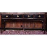Chinese black lacquered hardwood cabinet, fitted with four drawers and metal ring handles
