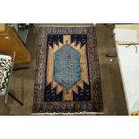 A Persian Maslaghan carpet