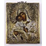 Russian silver mixed metal oklad clad icon of the Virgin and Child