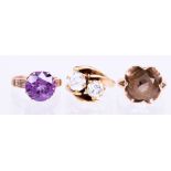 (Lot of 3) Synthetic color change sapphire, smoky quartz, white stone, 14k yellow gold rings