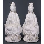 (lot of 2) A pair of seated Dehua Guanyin figures