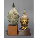 A pair of Thai brass sculpture heads