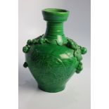 Chinese green ground porcelain vase with applied gourd vine decoration