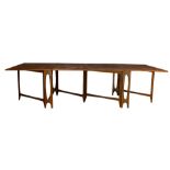 A Danish Modern style expandable dining table