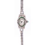 Lady's diamond, emerald, platinum, 14k white gold wristwatch