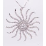 Diamond and 18k white gold sunburst pendant-necklace