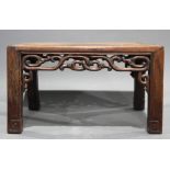 Small Chinese hardwood low table decorated with leafy vine tendril brackets