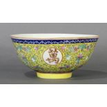 A Chinese Famille Rose yellow ground bowl