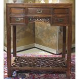 A Chinese blackwood dressing table with folding mirror