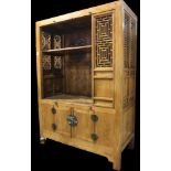 A large Chinese elmwood cabinet, 19 century,