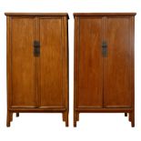 A pair of Chinese elm cabinets