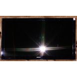 A Samsung 52" flat screen television, 32"h x 52"w