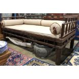 A Chinese nanmu daybed fitted with cushions