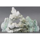 Chinese nephrite pictorial carving of mountain carved from pale green stone