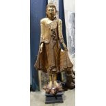 Burmese "jeweled" gilt wood standing figure of Buddha