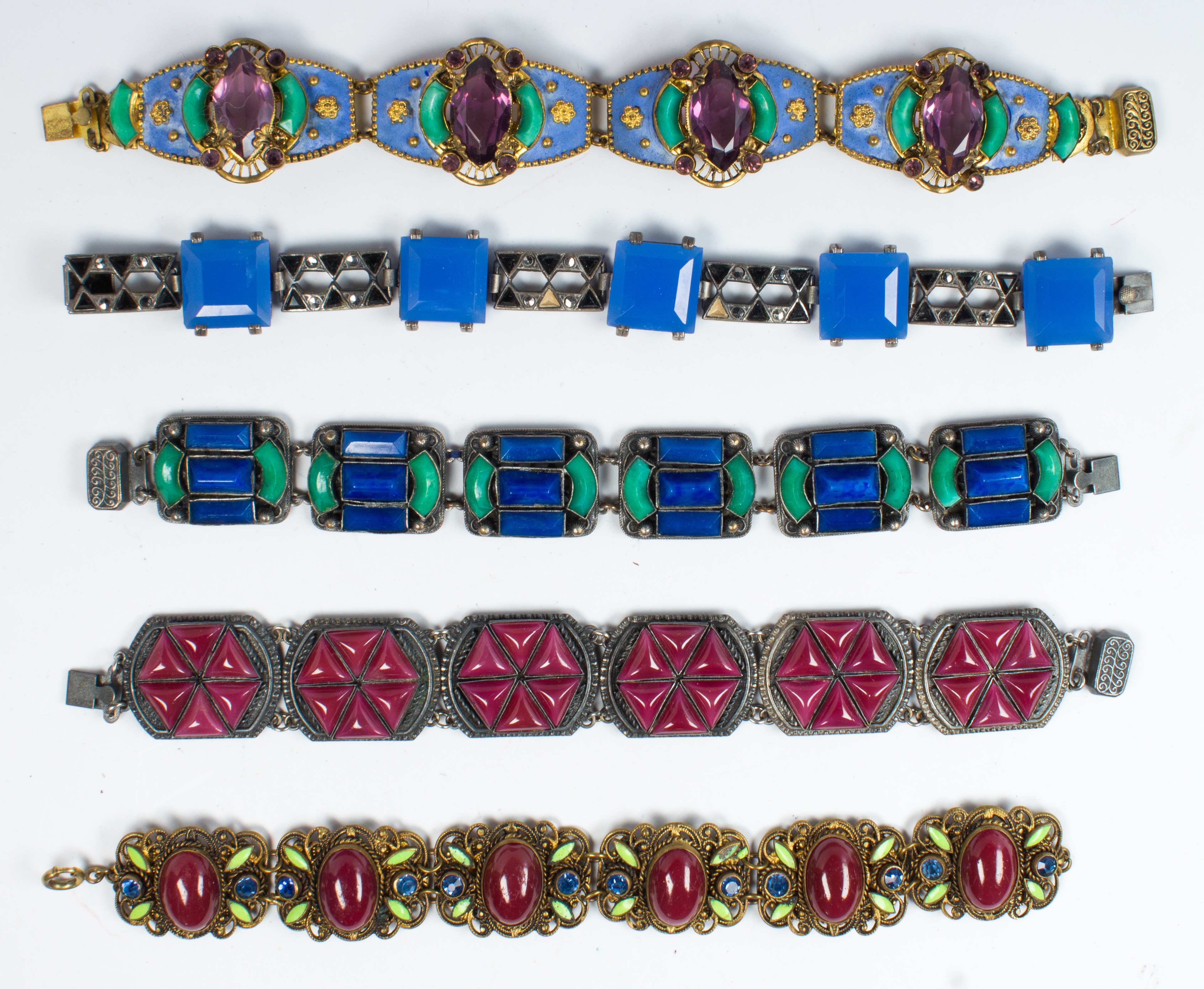 Collection of 5 multi-colored, metal bracelets