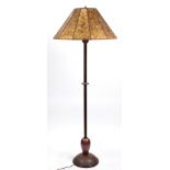 An Arts and Crafts style hammered copper and mica floor lamp