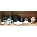 One shelf of Asian ceramics including Chinese teapot