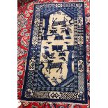 Chinese Baotou rug depicting phoenix & deer, 1'11.5" x 3"10