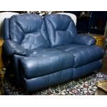 A leather rocking sofa