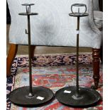 A pair of Japanese patinated metal candle prickets