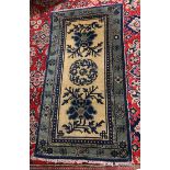 Chinese ivory rug centering a vine medallion with
