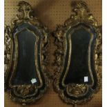 A pair of Italian giltwood mirrors