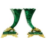 A pair of Neoclassical style malachite ryhton form vases