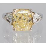 Natural fancy light yellow diamond, diamond, 18k white gold and platinum ring