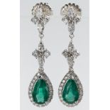 Pair of emerald, diamond, 18k white gold earrings