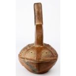 A Pre-Columbian style red clay stirrup vessel