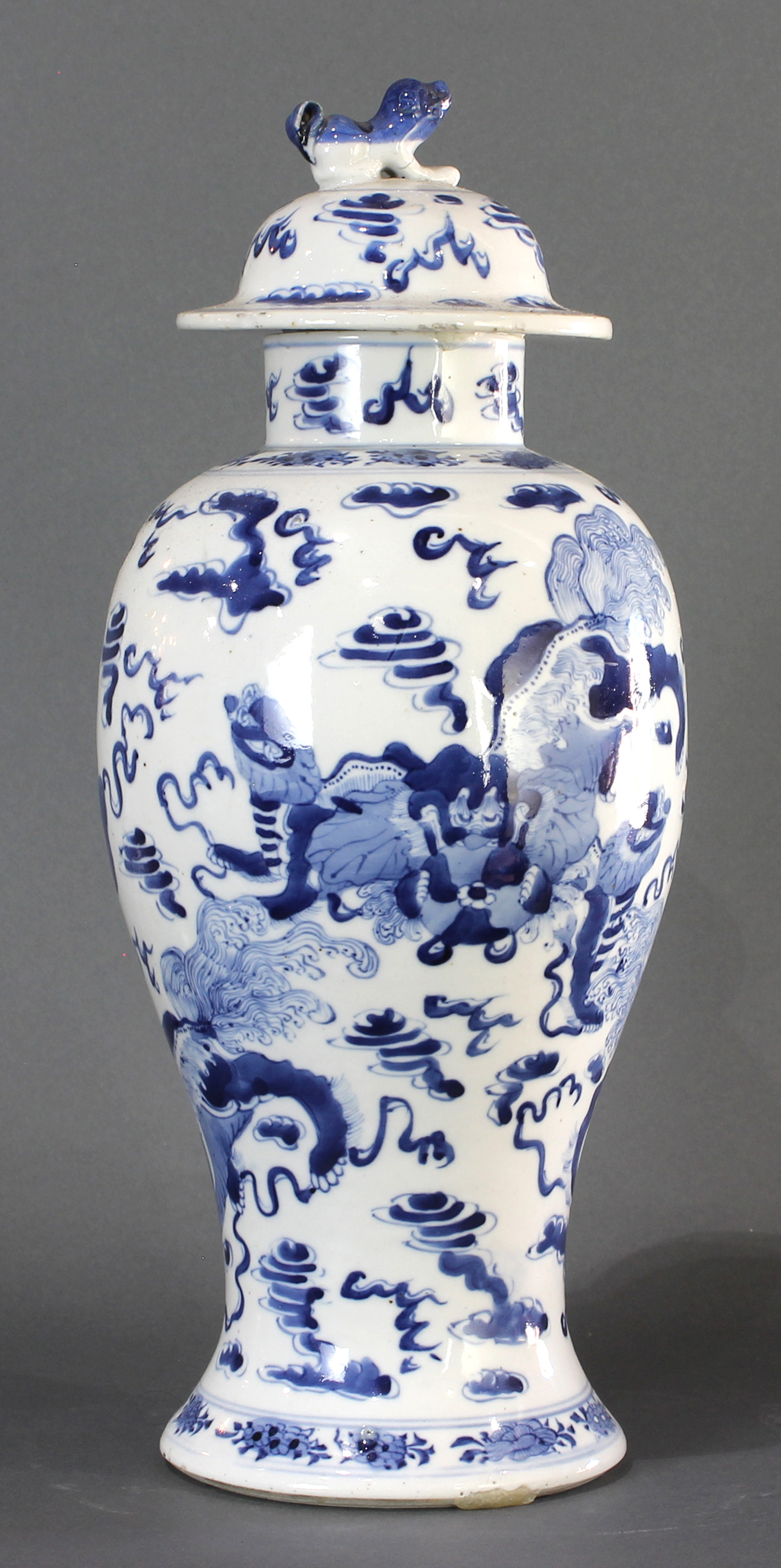 A Chinese blue and white qilin covered urn.