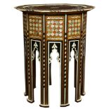 A Moroccan inlaid octagonal table
