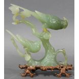 Chinese pale green serpentine carving of two birds perched on tree
