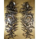 A pair of Baroque style giltwood carved wall elements