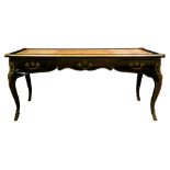 A Louis XV style ormolu mounted bureau plat