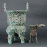(lot of 2) Archaistic verdigris patinated metal tripod vessels