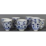 (lot of 33) An assembled set of Chinese blue and white bowls and cups