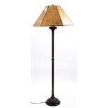 An Arts and Crafts style mica floor lamp, having a hexagonal shade