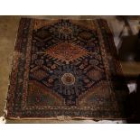 A Persian mat 3'8" x 2'11"