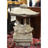 Japanese cast stone lantern rising on a plinth base