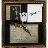 A framed Luciano Pavarotti concert program from the 1991 performance at Pebble Beach (CA)