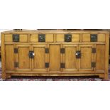 A Chinese elmwood sideboard cabinet