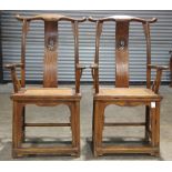 A pair of Chinese elmwood chairs