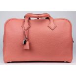 Hermes salmon pink victoria II 35 bag in Taurillon Clemence leather
