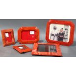 (lot of 5) Contemporary red decorated frames in various sizes